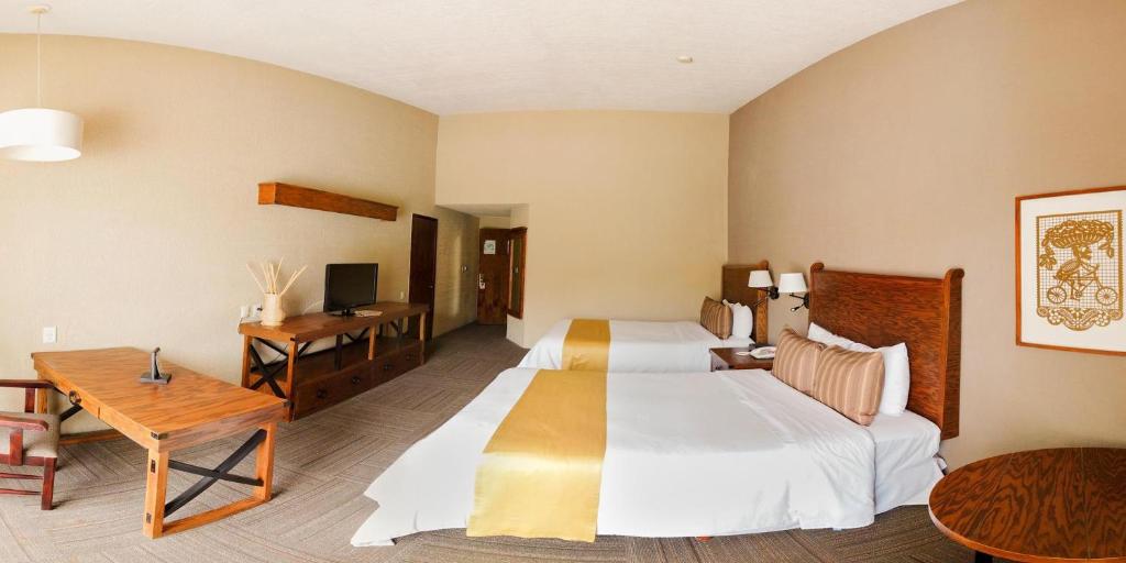 Postel nebo postele na pokoji v ubytování Real de Minas San Miguel de Allende