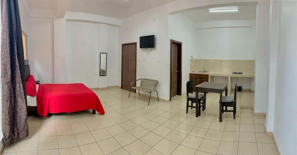 TV a/nebo společenská místnost v ubytování Hotel boutique turquesa