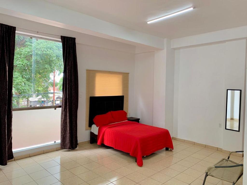 Postel nebo postele na pokoji v ubytování Hotel boutique turquesa