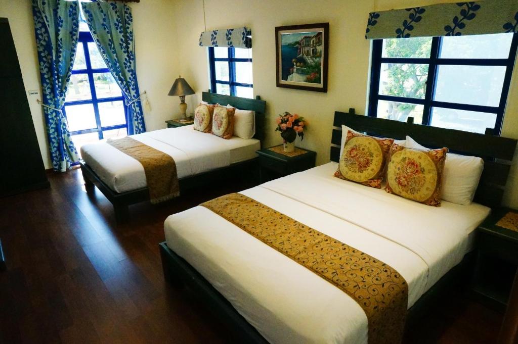 Un pat sau paturi într-o cameră la Sine Ya Hostel
