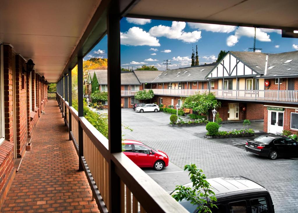a view of a parking lot from a balcony at Elizabethan Lodge in Melbourne