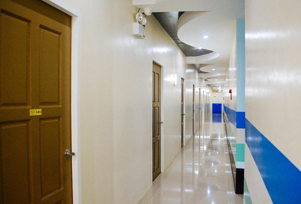 Fotografie z fotogalerie ubytování RedDoorz at EM Pensiontel Butuan City v destinaci Butuan