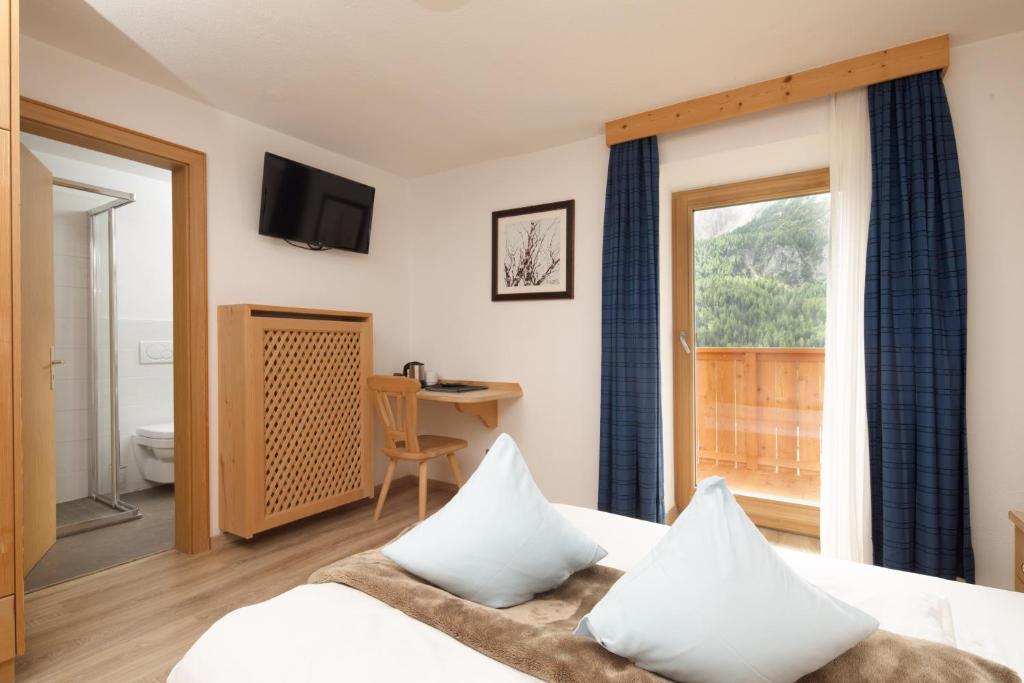 Postel nebo postele na pokoji v ubytování Declara B&B and apartaments