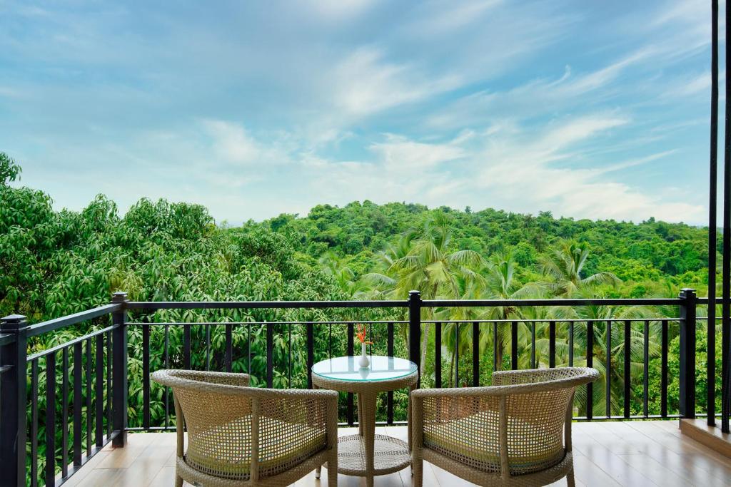 Balkón nebo terasa v ubytování Amoravida By 7 Apple Resorts, Goa
