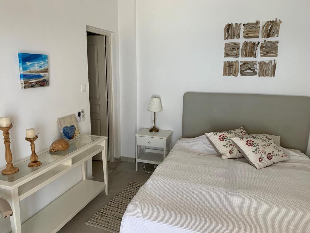 Кровать или кровати в номере Villa Salina Luxury Pool Villa