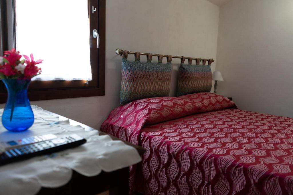 A bed or beds in a room at B&B 4 Stagioni