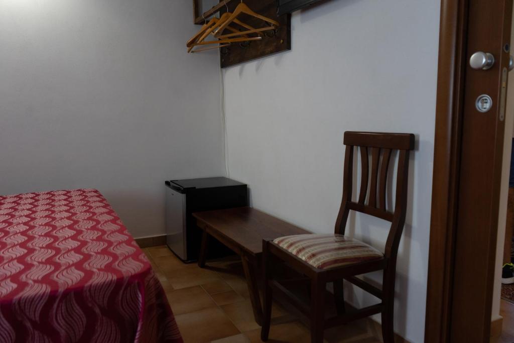 A bed or beds in a room at B&B 4 Stagioni