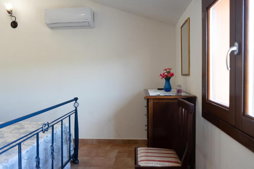A bed or beds in a room at B&B 4 Stagioni