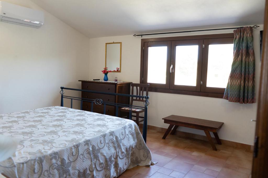 A bed or beds in a room at B&B 4 Stagioni