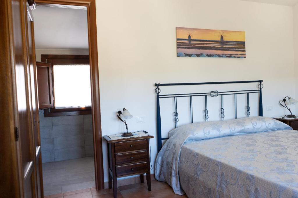 A bed or beds in a room at B&B 4 Stagioni