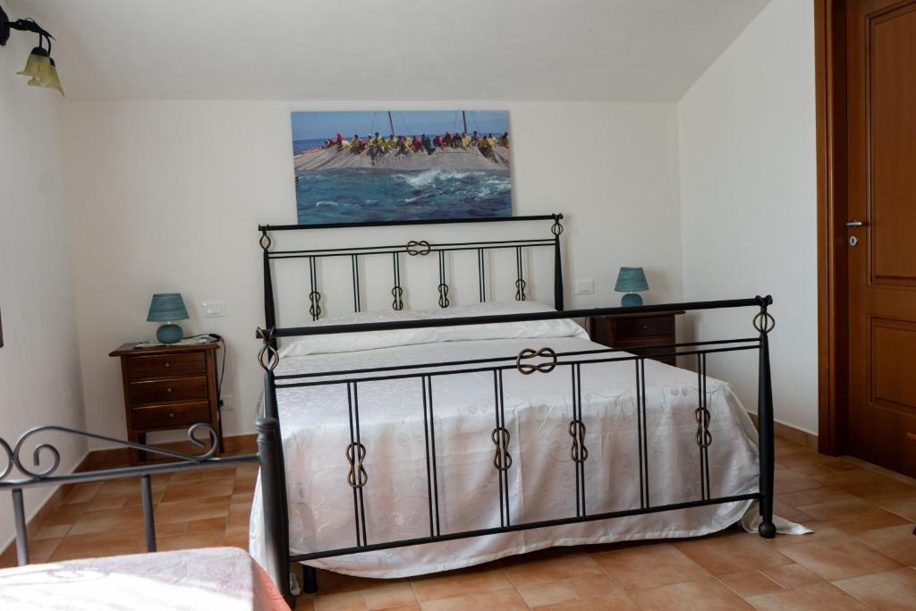 A bed or beds in a room at B&B 4 Stagioni