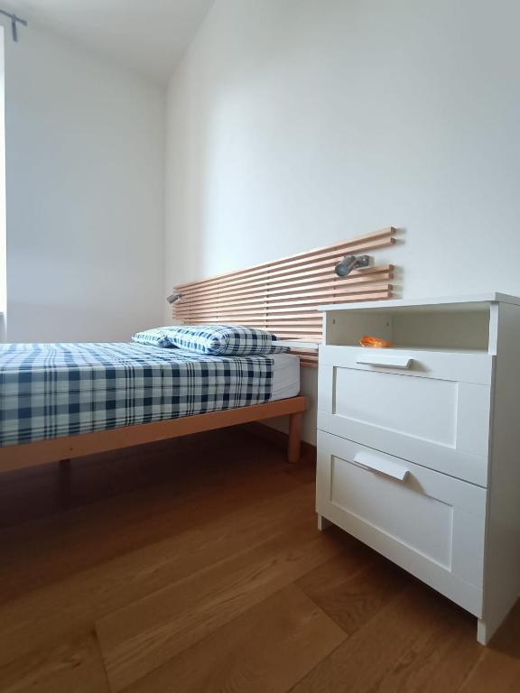 Łóżko lub łóżka w pokoju w obiekcie Panperduto