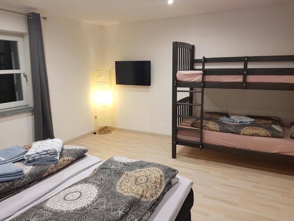 Poschodová posteľ alebo postele v izbe v ubytovaní Haus Soestblick - Ferienwohnung