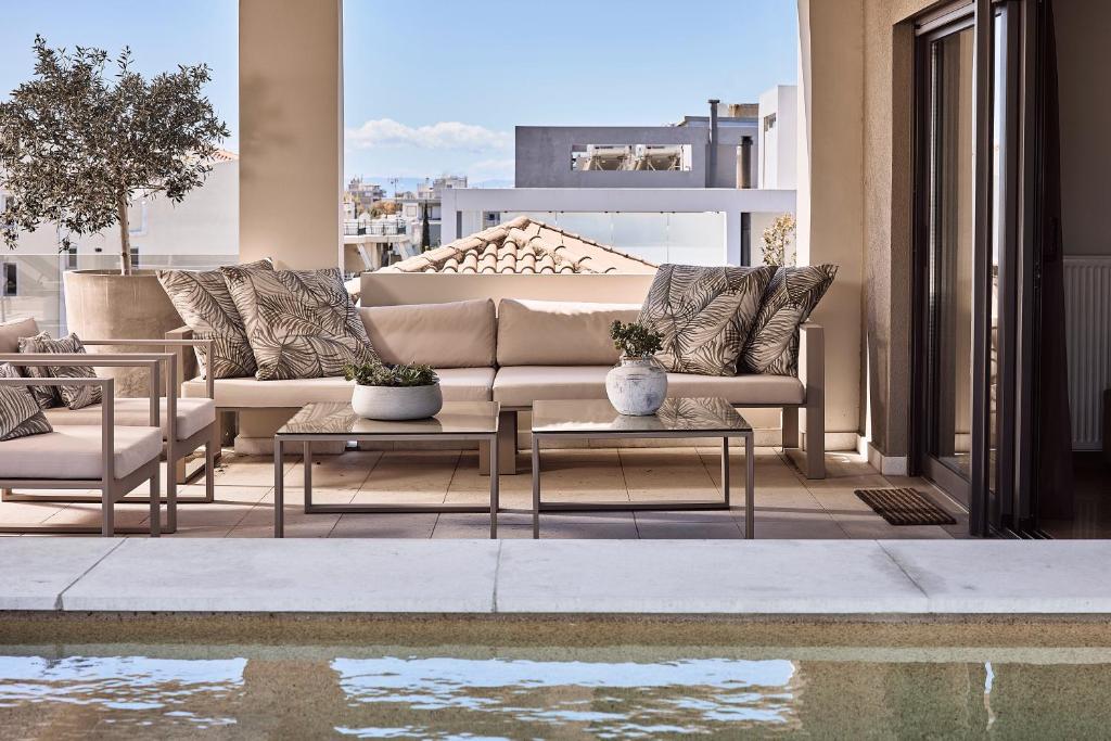 Posedenie v ubytovaní Elaia Luxury Apartments Glyfada