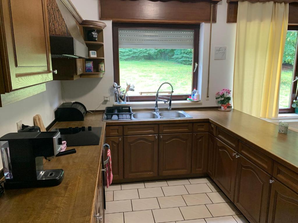 Kuchyň nebo kuchyňský kout v ubytování House Bastogne