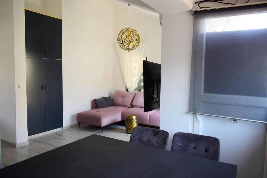 Postel nebo postele na pokoji v ubytování Apartmani Lavin