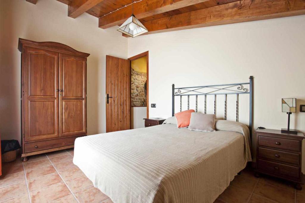 Postel nebo postele na pokoji v ubytování Casa Rural Ca Lazaro