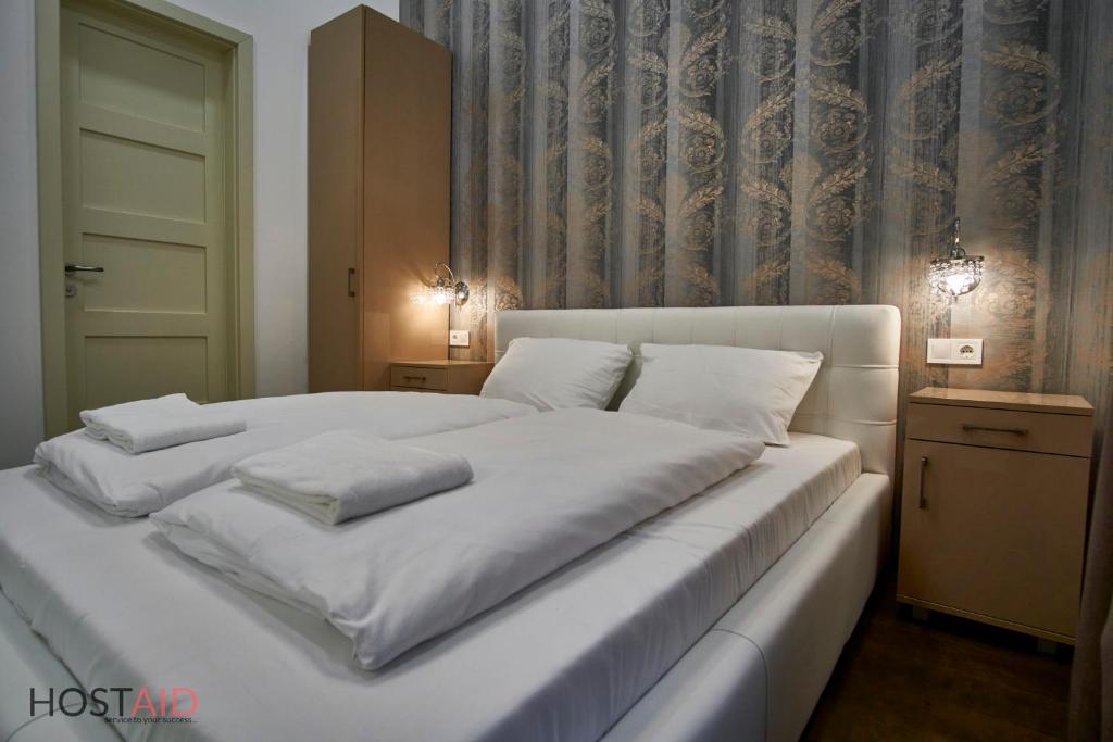Posteľ alebo postele v izbe v ubytovaní G7 Budapest - hostAID