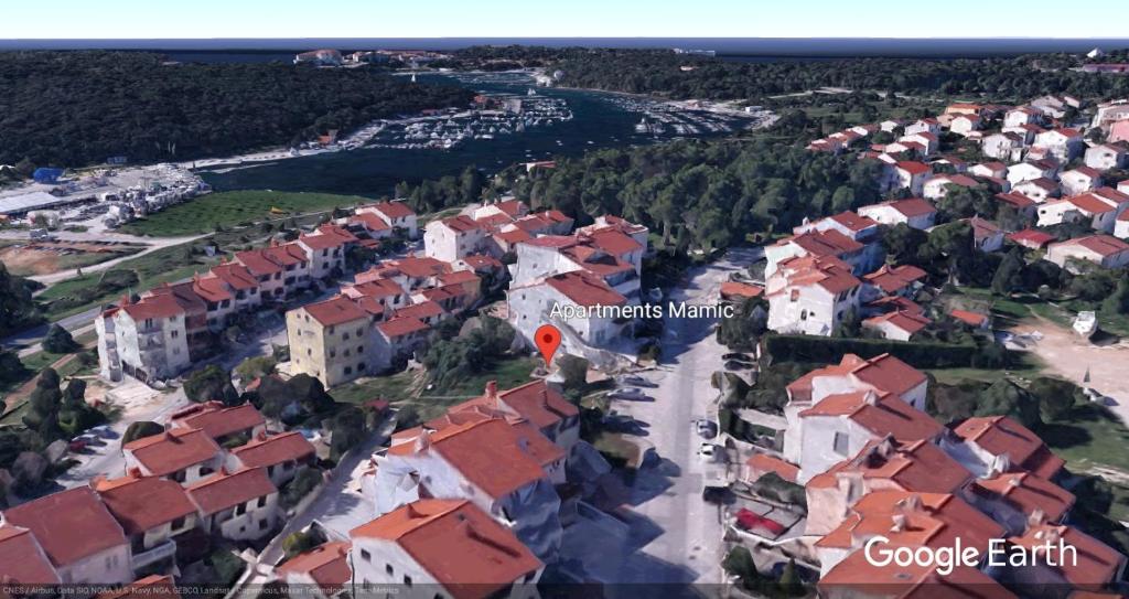 an aerial view of a town with red roofs at Apartments Mamic in Pula