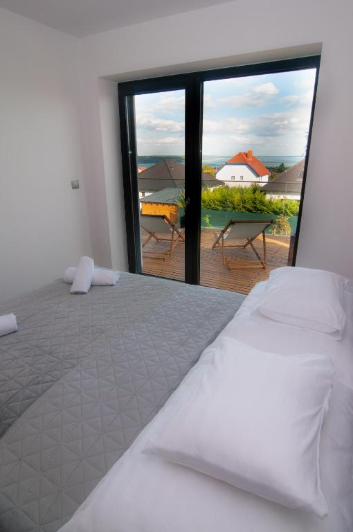 Postel nebo postele na pokoji v ubytování Skyline Resort
