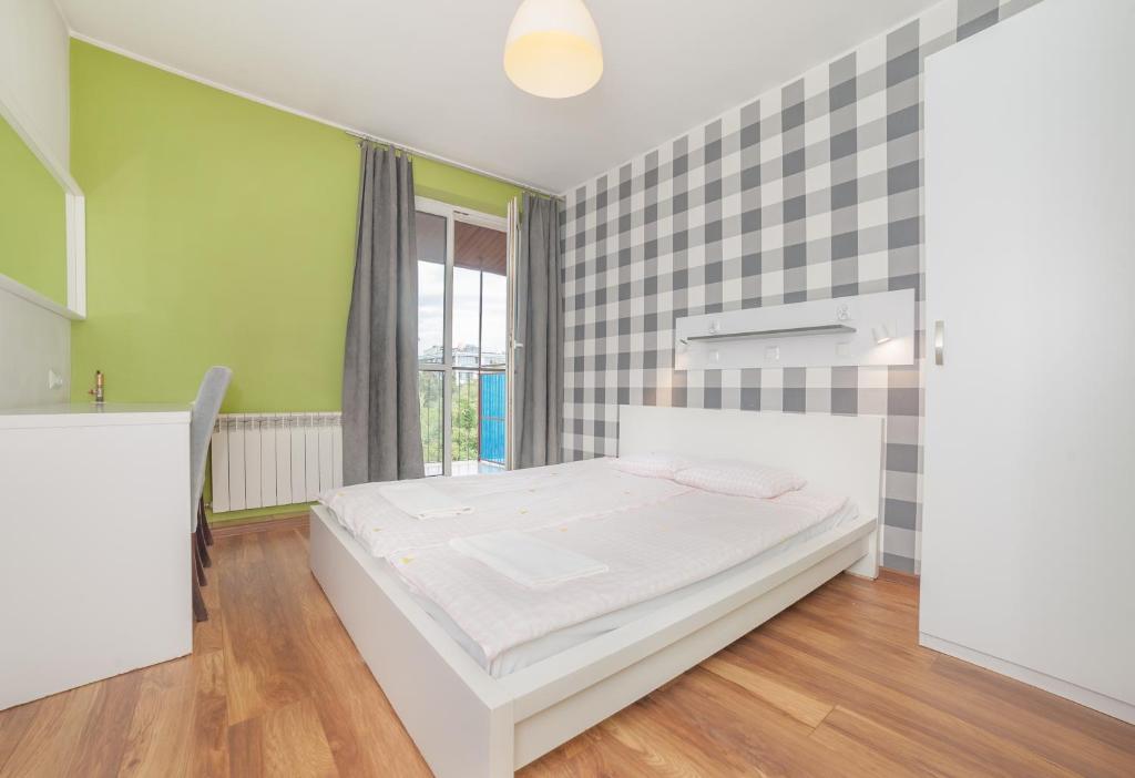 Posteľ alebo postele v izbe v ubytovaní Tatamka Hostel