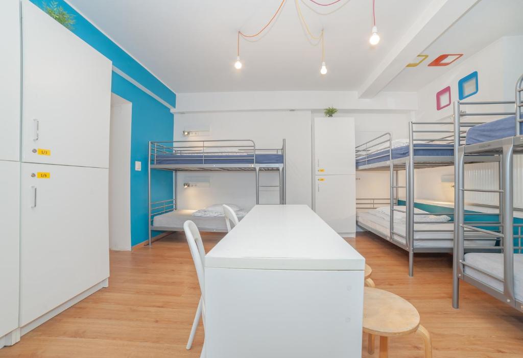 Posteľ alebo postele v izbe v ubytovaní Tatamka Hostel