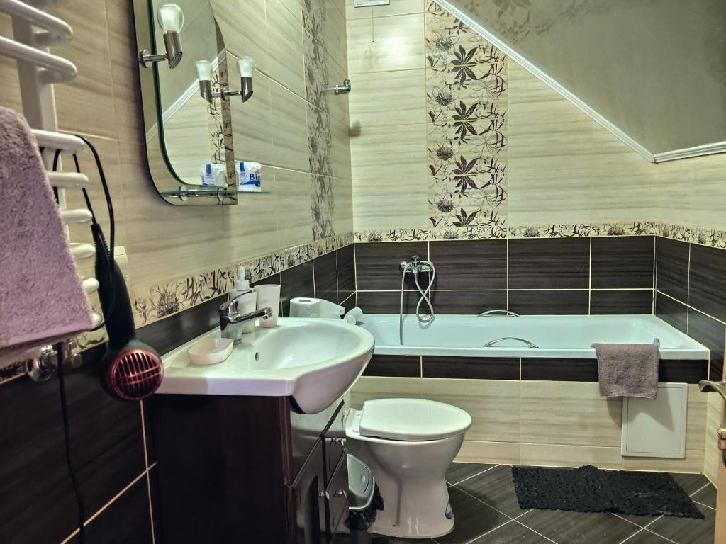 Ванная комната в Sadyba Zatyshok
