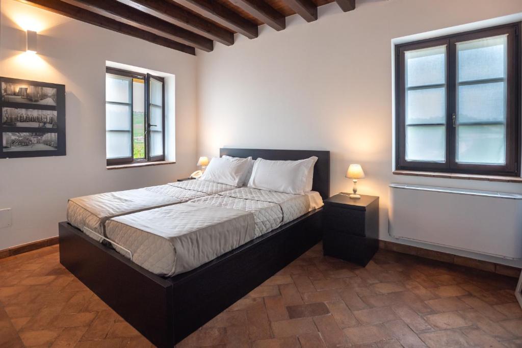 Posteľ alebo postele v izbe v ubytovaní Al Pompiere - Wine and rooms