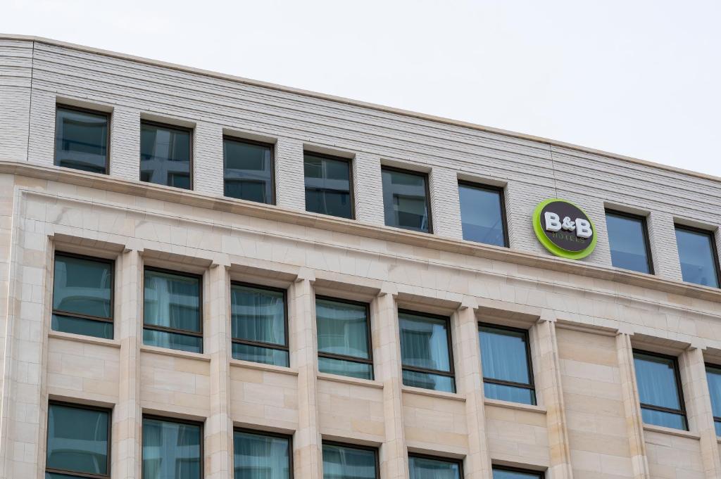 a building with a bbc sign on the side at B&B HOTEL Antwerpen Centrum in Antwerp