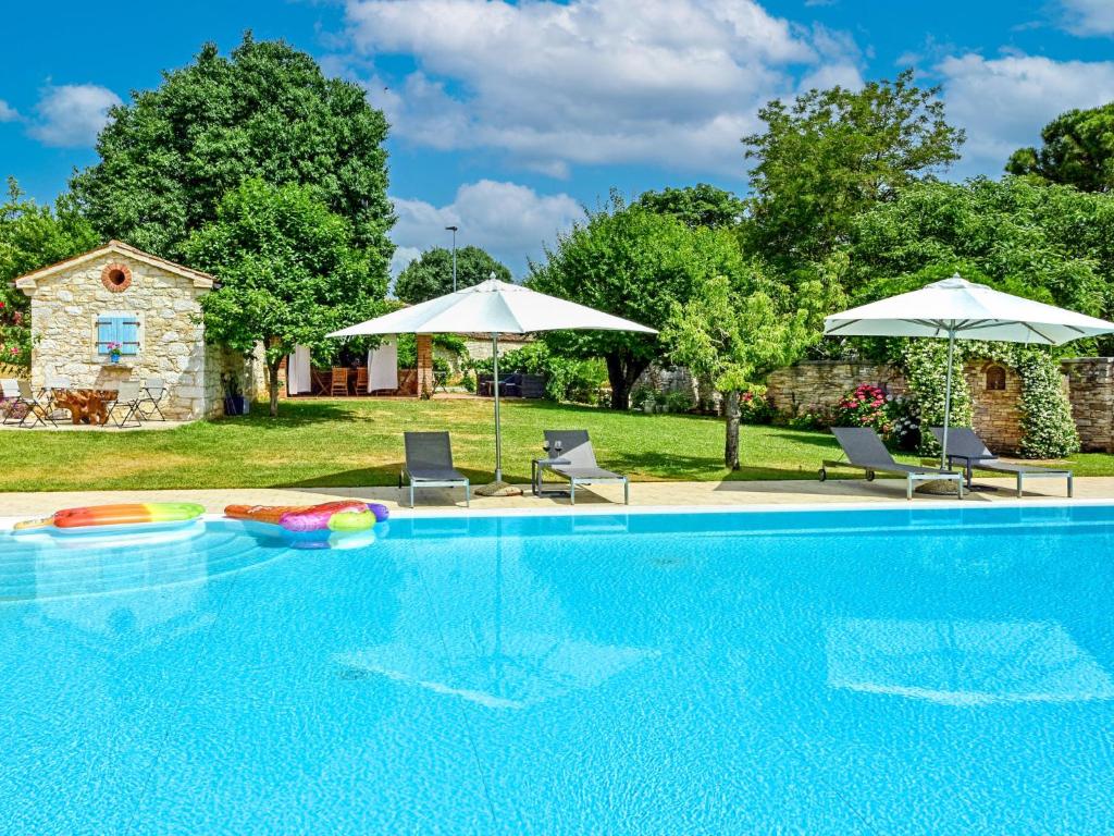 Bazén v ubytovaní Holiday Home Hibiskus by Interhome alebo v jeho blízkosti