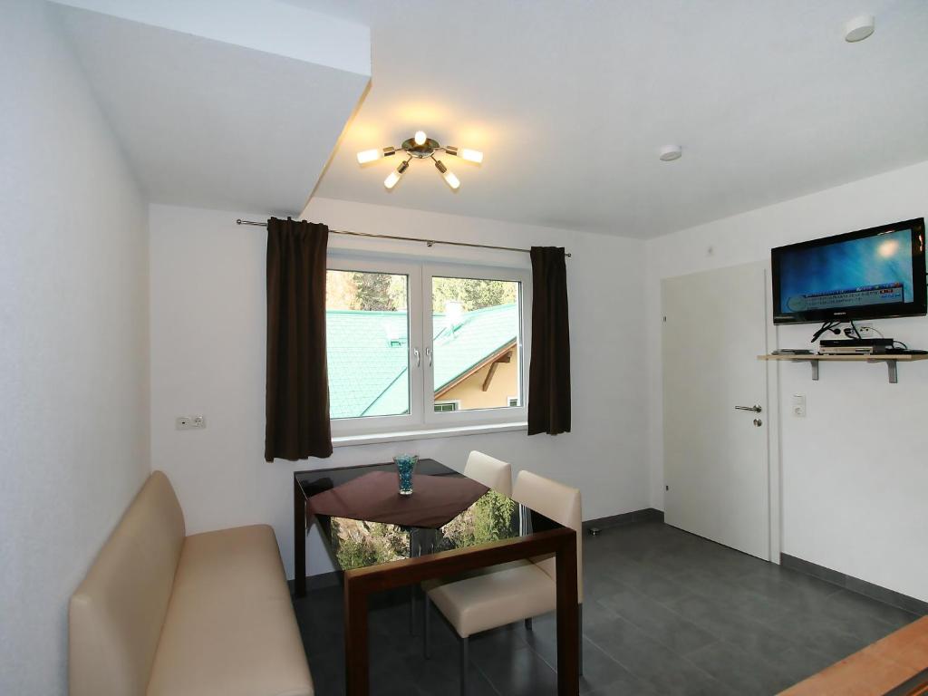 TV a/nebo společenská místnost v ubytování Apartment Collina by Interhome