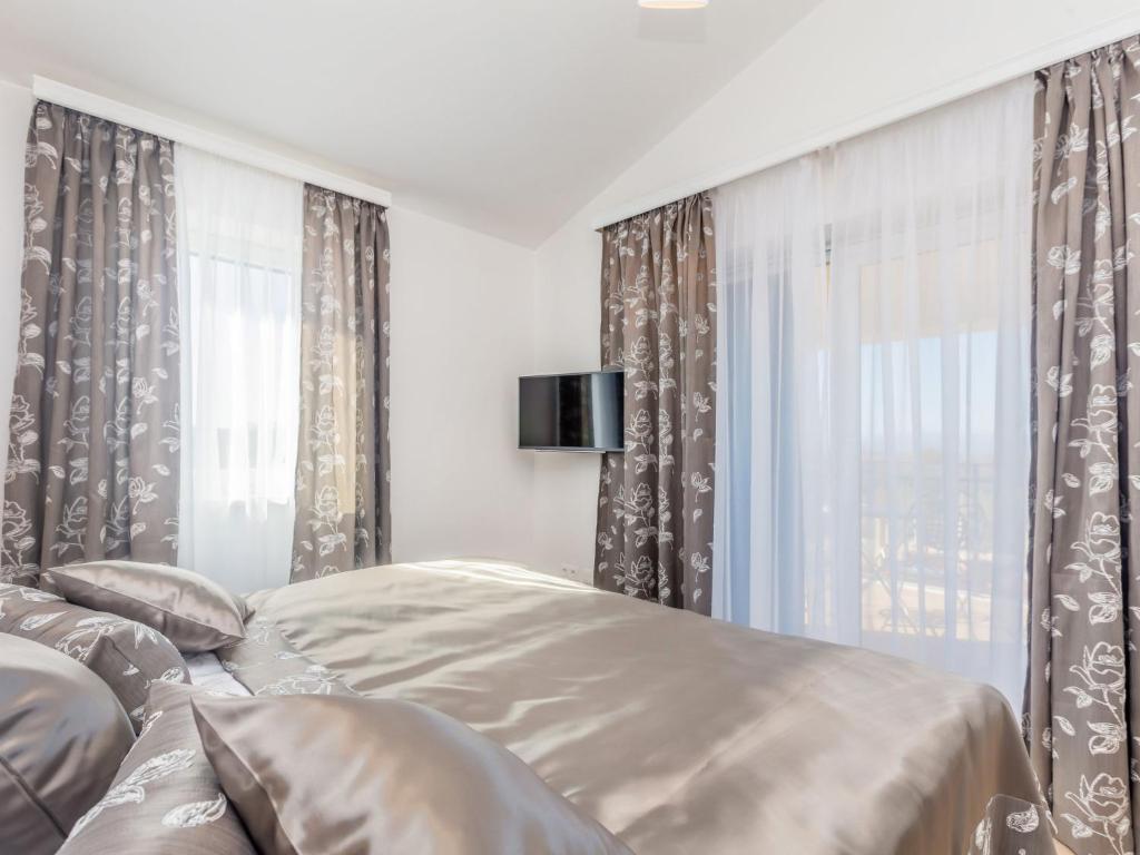 Postel nebo postele na pokoji v ubytování Villa Roko by Interhome