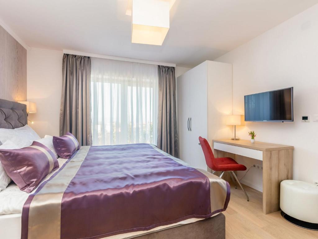 Postel nebo postele na pokoji v ubytování Villa Roko by Interhome