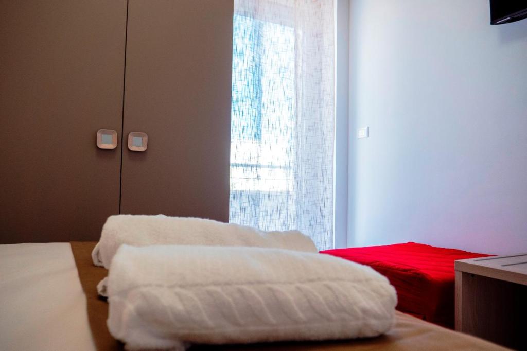 Postel nebo postele na pokoji v ubytování B&B A Un Passo dal Mare