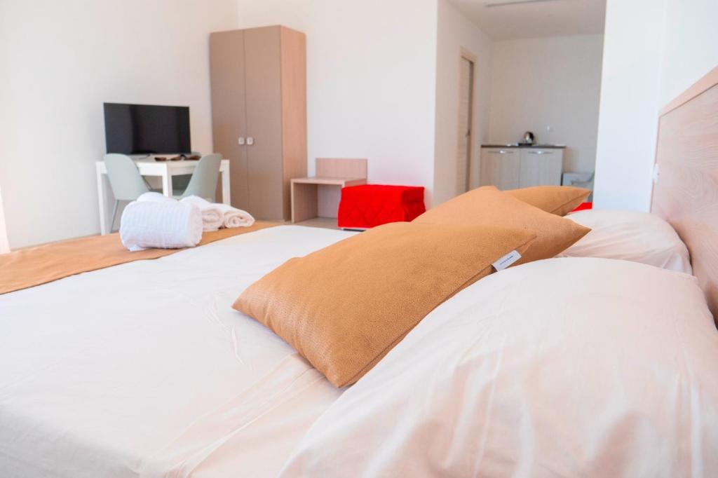 Postel nebo postele na pokoji v ubytování B&B A Un Passo dal Mare