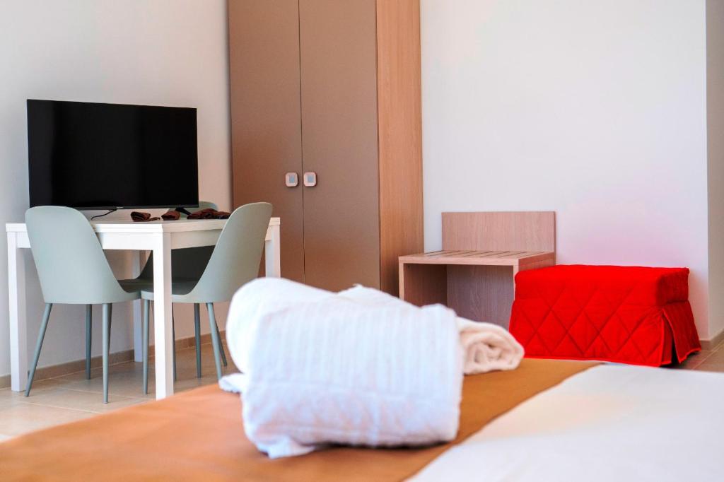 TV a/nebo společenská místnost v ubytování B&B A Un Passo dal Mare