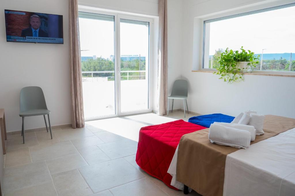 Postel nebo postele na pokoji v ubytování B&B A Un Passo dal Mare