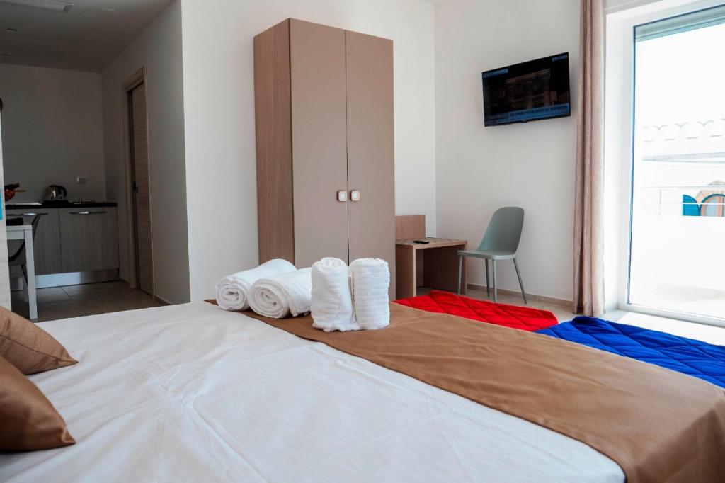 Postel nebo postele na pokoji v ubytování B&B A Un Passo dal Mare