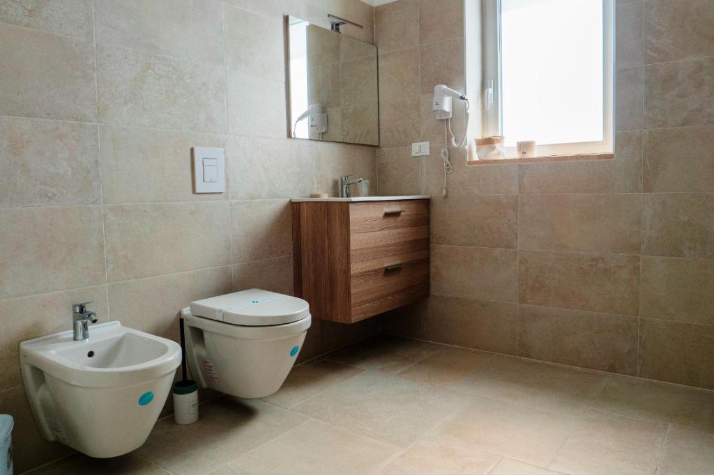 Koupelna v ubytování B&B A Un Passo dal Mare