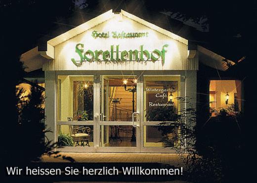 a restaurant with a sign on the front of it at Forellenhof in Bad Sassendorf