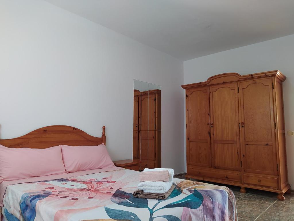 Postel nebo postele na pokoji v ubytování Casa Érika Tarajalejo