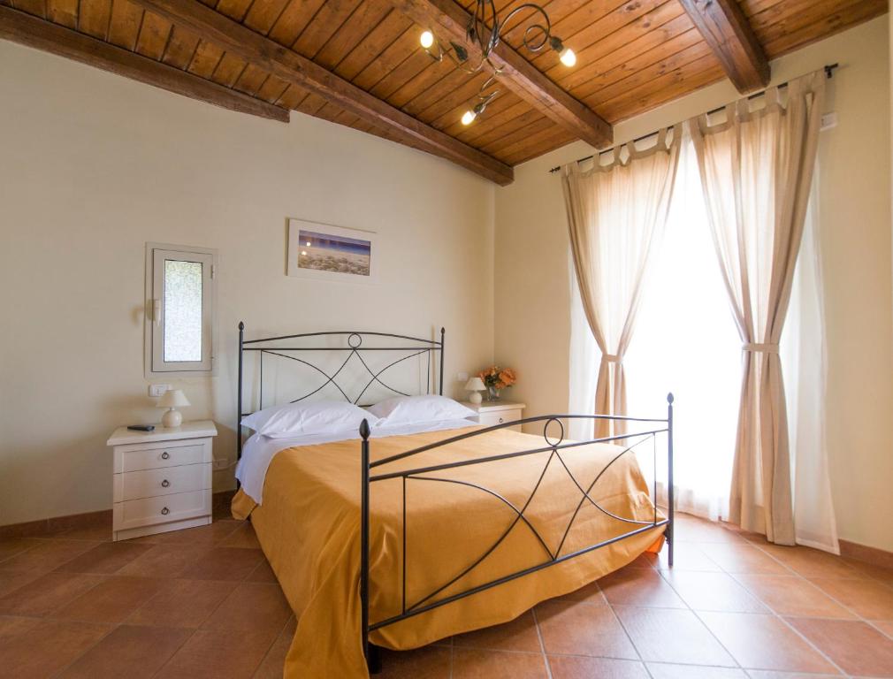 Ένα ή περισσότερα κρεβάτια σε δωμάτιο στο Residenza Principe Di Piemonte