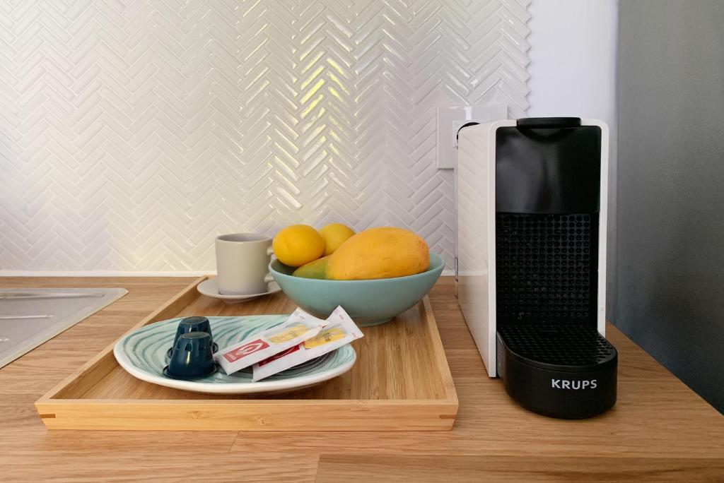 Coffee and tea making facilities at Apartamento Playa Calera