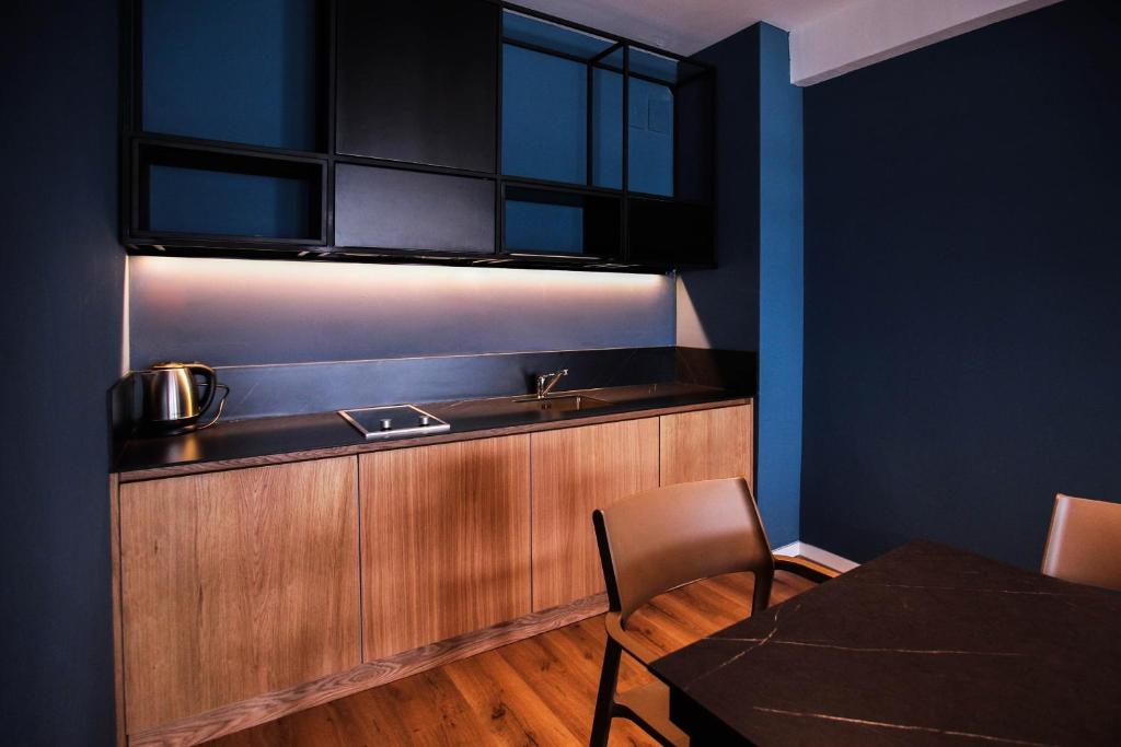 Kuchyň nebo kuchyňský kout v ubytování Swiss Apartments Prishtina