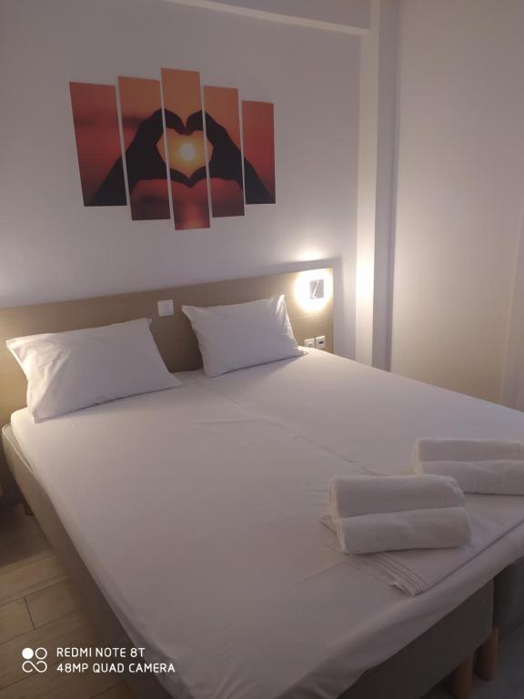 Posteľ alebo postele v izbe v ubytovaní AKTIS MAKRIGIALOS LUXURY APTS