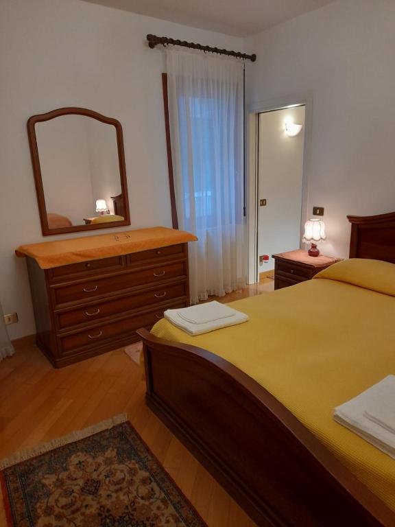 Posteľ alebo postele v izbe v ubytovaní come a casa tua dietro piazza San Marco