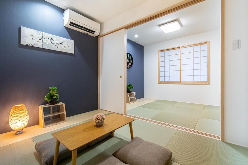 En eller flere senger på et rom på Pau-lele天下茶屋東