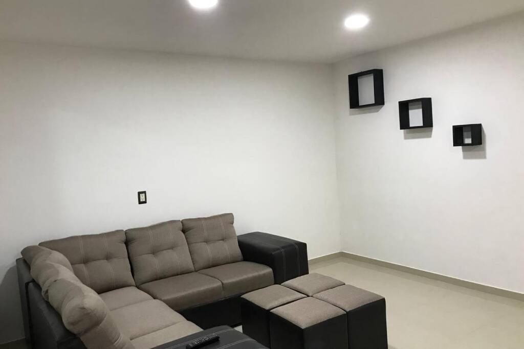 Posezení v ubytování Casa minimalista tranquila y acogedora, con garage