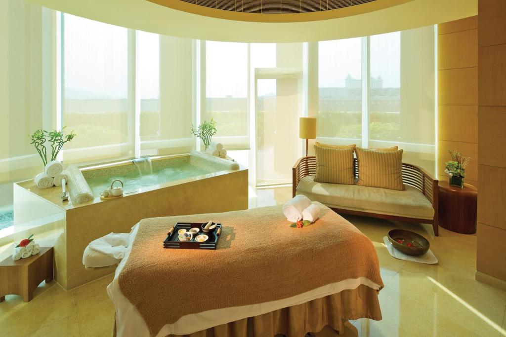 Postel nebo postele na pokoji v ubytování Four Seasons Hotel Macao