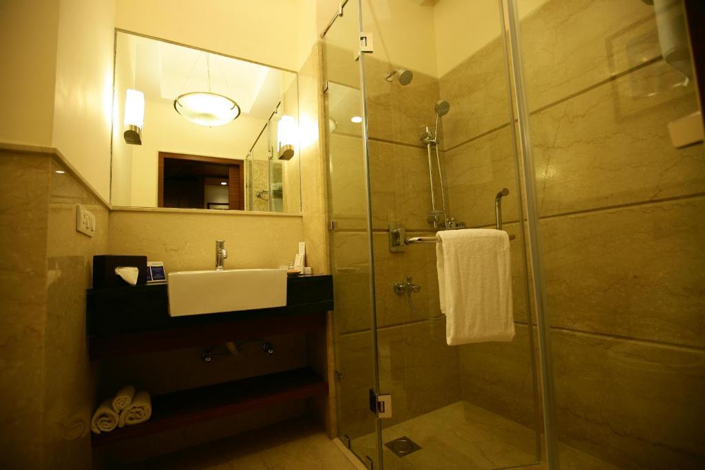 Koupelna v ubytování Muse Sarovar Portico Nehru Place